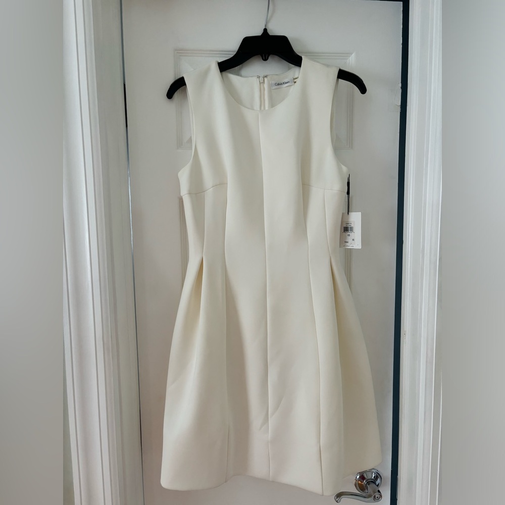 Calvin Klein cream dress in a size 10